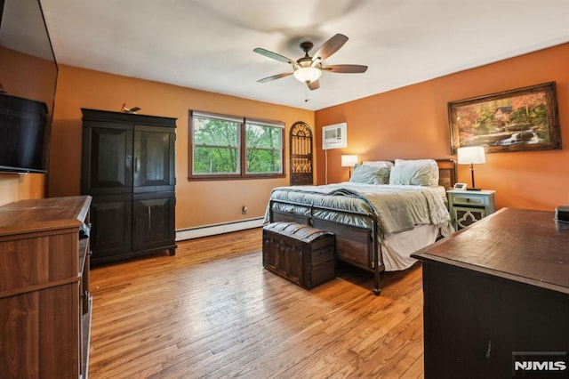 11 Beech Ct, Ringwood, NJ 07456 - bedroom with a baseboard heating unit, light wood-type flooring, ceiling fan, and baseboards
