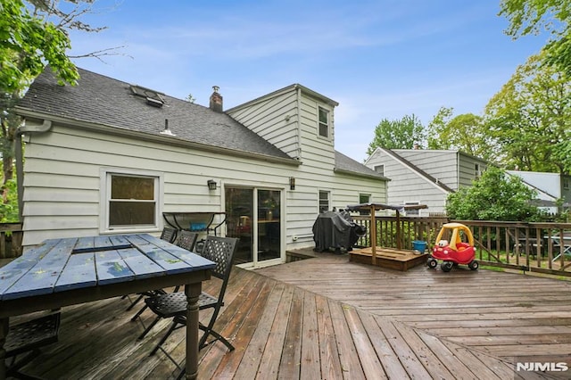 11 Beech Ct, Ringwood, NJ 07456 - wooden deck featuring outdoor dining space and area for grilling