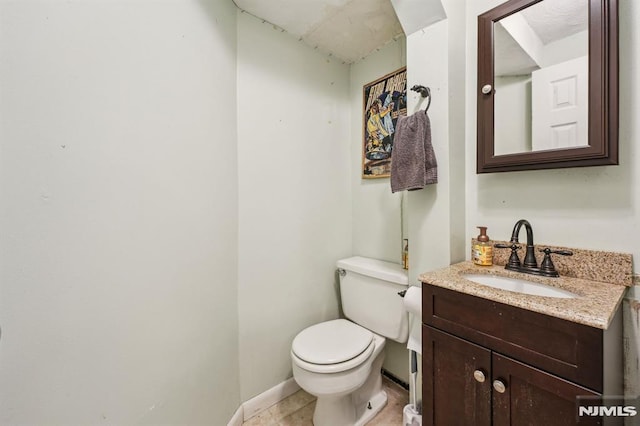 11 Beech Ct, Ringwood, NJ 07456 - half bath featuring toilet, vanity, and baseboards