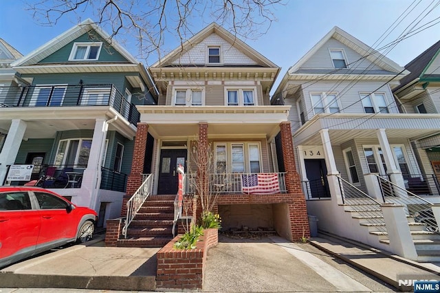 136 Shippen St, Weehawken, NJ 07086 - view of property featuring covered porch and stairs