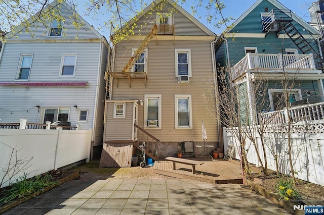 136 Shippen St, Weehawken, NJ 07086 - back of house with fence and a patio area