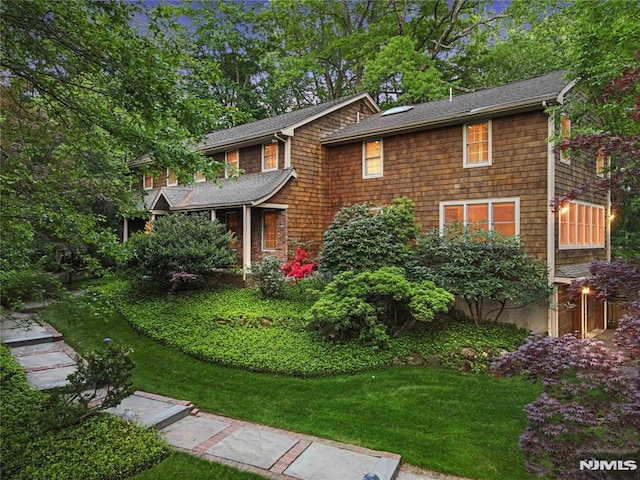 2 Canterbury Ct, Alpine, NJ 07620 - shingle-style home with a front yard and roof with shingles
