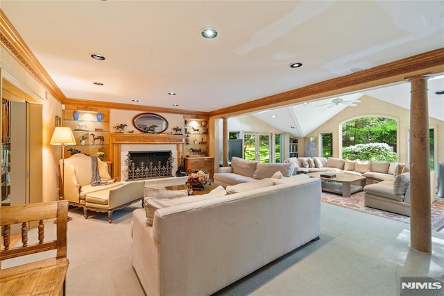 2 Canterbury Ct, Alpine, NJ 07620 - carpeted living area with ceiling fan, vaulted ceiling, a fireplace, recessed lighting, and built in shelves
