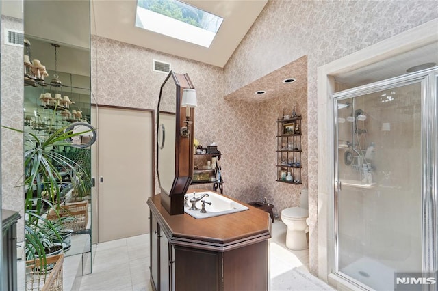 2 Canterbury Ct, Alpine, NJ 07620 - bathroom featuring a skylight, a shower stall, toilet, vanity, and vaulted ceiling