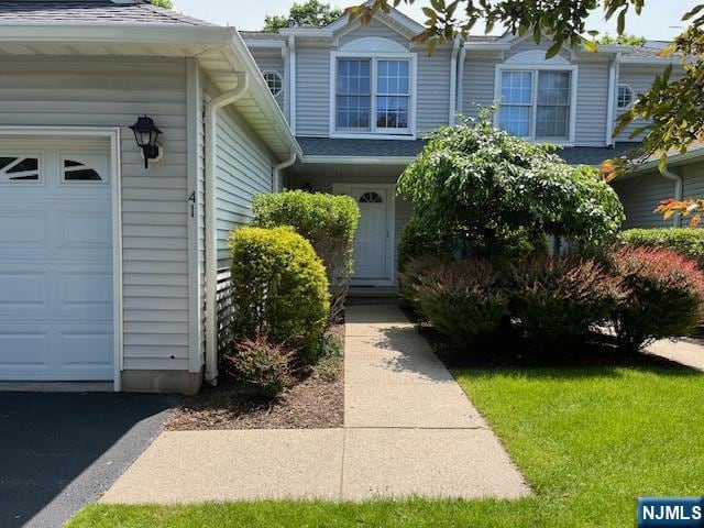 41 Foxwood Sq, Old Tappan, NJ 07675 - doorway to property with a garage