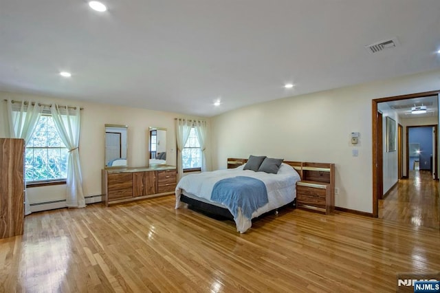 2 Morgan Ct, Montvale, NJ 07645 - bedroom with light wood-style flooring, a baseboard radiator, baseboards, and recessed lighting