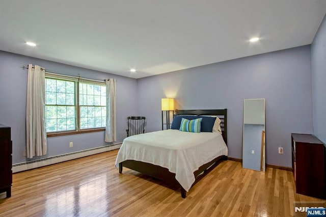 2 Morgan Ct, Montvale, NJ 07645 - bedroom featuring a baseboard radiator, wood finished floors, baseboards, and recessed lighting