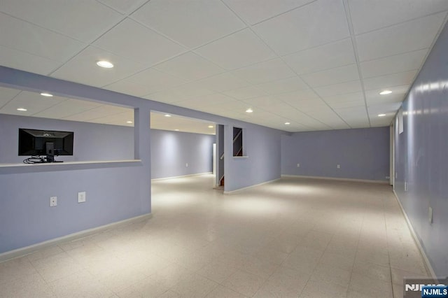 2 Morgan Ct, Montvale, NJ 07645 - finished below grade area featuring a paneled ceiling, baseboards, tile patterned floors, and recessed lighting