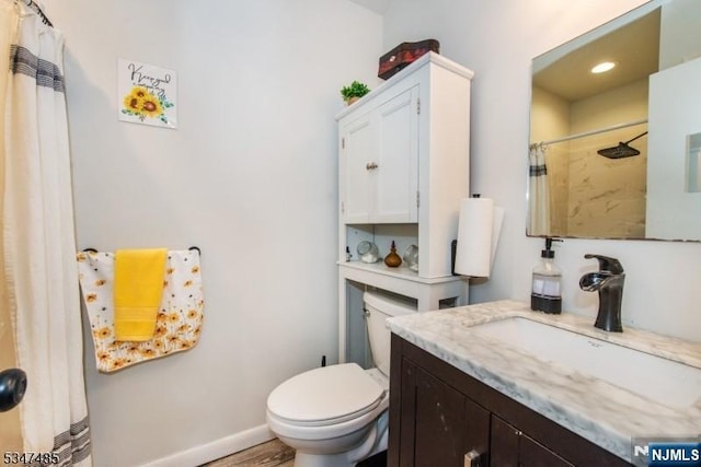 4 Winter Park Dr Unit 4, Vernon, NJ 07462 - bathroom with toilet, baseboards, vanity, a shower with shower curtain, and wood finished floors