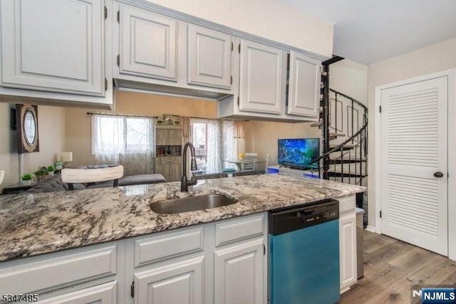 4 Winter Park Dr Unit 4, Vernon, NJ 07462 - kitchen featuring dishwasher, a sink, light stone countertops, wood finished floors, and white cabinets