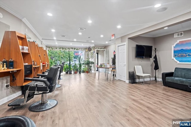 building lobby featuring ornamental molding and recessed lighting
