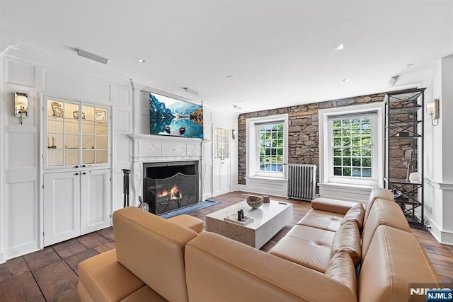 868 Goffle Rd, Hawthorne, NJ 07506 - living room featuring dark wood finished floors, a warm lit fireplace, and recessed lighting