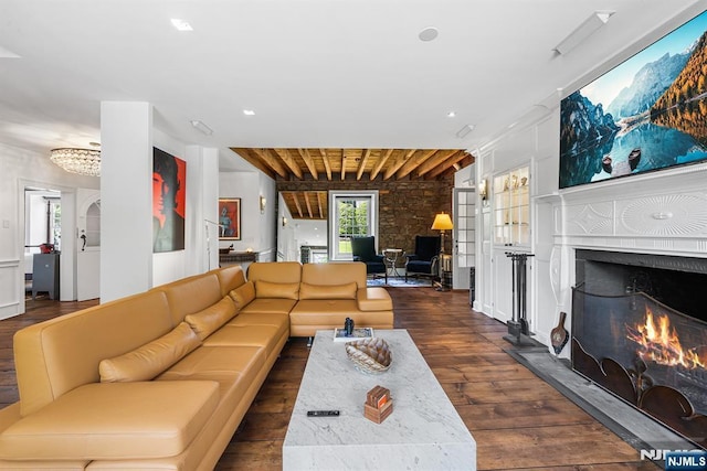868 Goffle Rd, Hawthorne, NJ 07506 - living area featuring dark wood-style flooring, a lit fireplace, and recessed lighting