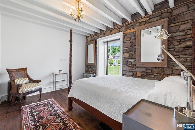 868 Goffle Rd, Hawthorne, NJ 07506 - bedroom with hardwood / wood-style flooring, beam ceiling, and a chandelier