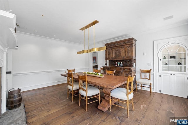 868 Goffle Rd, Hawthorne, NJ 07506 - dining space featuring crown molding and hardwood / wood-style flooring