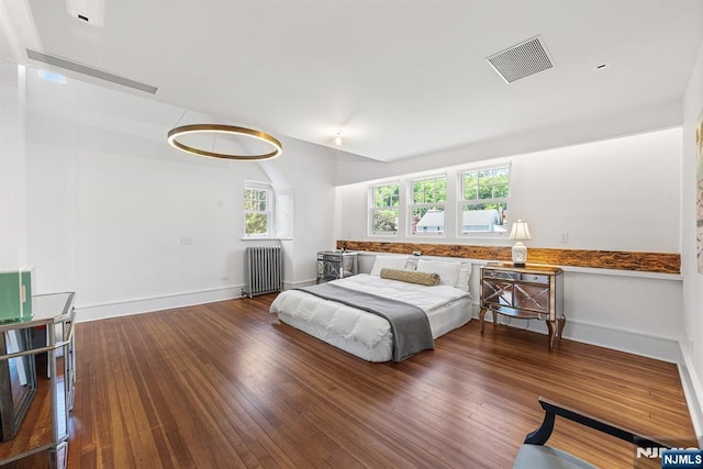 868 Goffle Rd, Hawthorne, NJ 07506 - bedroom featuring radiator, wood finished floors, and baseboards