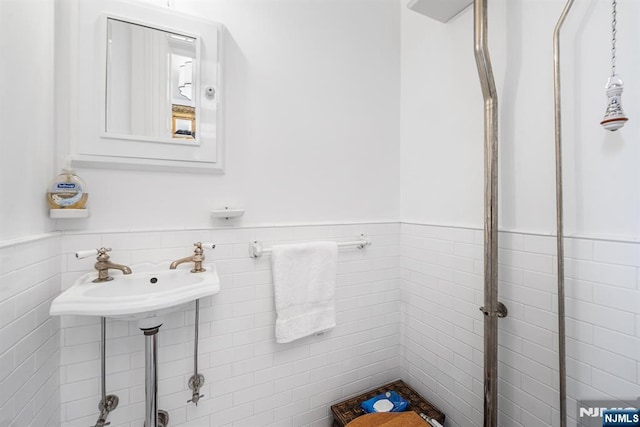 868 Goffle Rd, Hawthorne, NJ 07506 - bathroom with wainscoting and tile walls