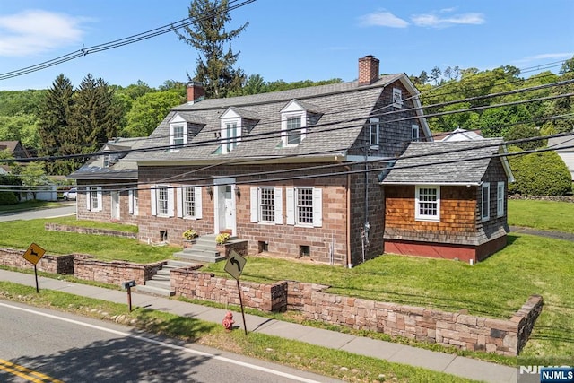 868 Goffle Rd, Hawthorne, NJ 07506 - view of front of property with a chimney, a front lawn, and a gambrel roof