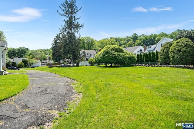 868 Goffle Rd, Hawthorne, NJ 07506 - view of asphalt driveway with a residential view