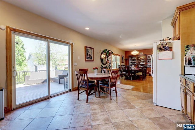 543 Page Ave, Lyndhurst, NJ 07071 - dining area with plenty of natural light, a chandelier, recessed lighting, and light tile patterned floors