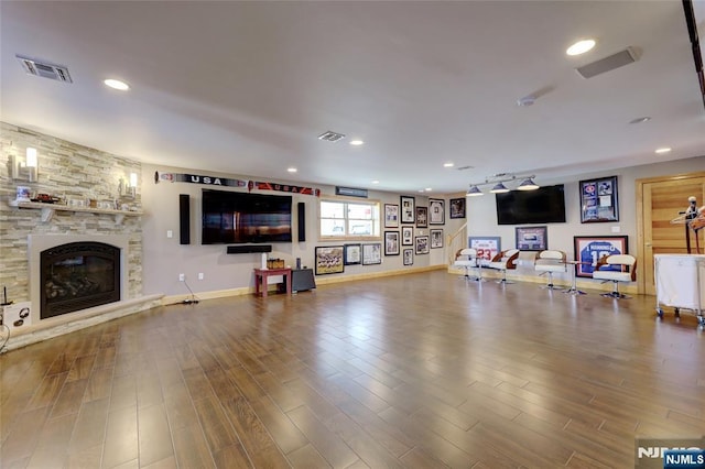 543 Page Ave, Lyndhurst, NJ 07071 - living area featuring a fireplace, wood finished floors, baseboards, and recessed lighting