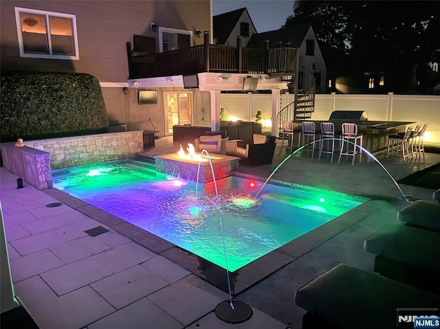 543 Page Ave, Lyndhurst, NJ 07071 - view of swimming pool with a fire pit, a patio area, stairs, and a pool with connected hot tub