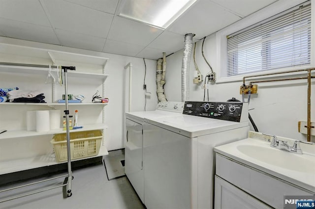 laundry room featuring washing machine and clothes dryer