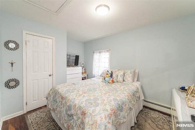 20 Park Dr, Oakland, NJ 07436 - bedroom featuring attic access, wood finished floors, a baseboard radiator, and baseboards