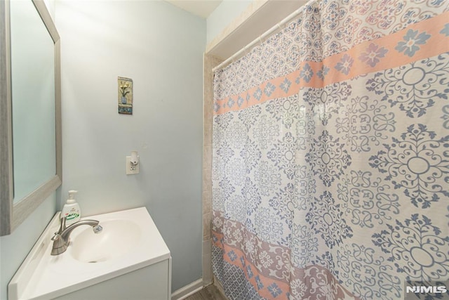 20 Park Dr, Oakland, NJ 07436 - full bath with vanity and a shower with shower curtain