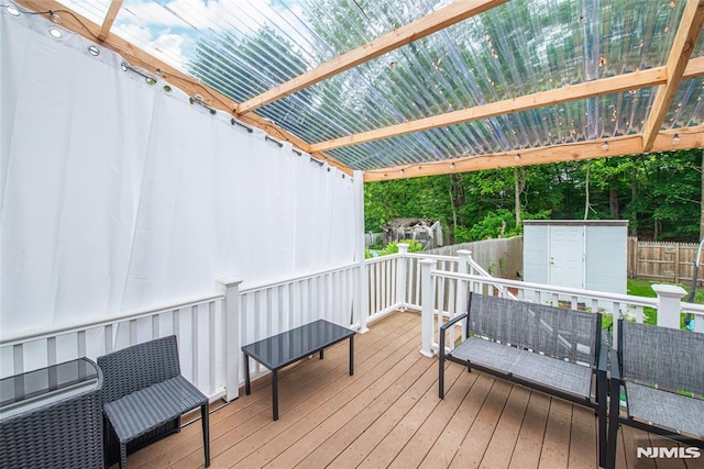 20 Park Dr, Oakland, NJ 07436 - deck featuring a fenced backyard, an outdoor structure, and a shed