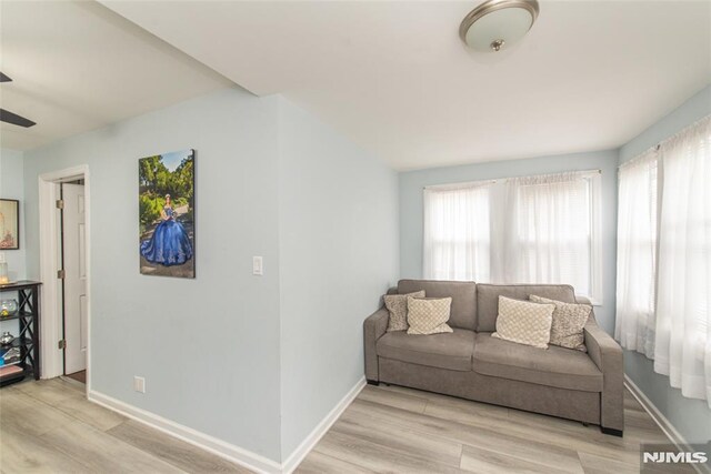 20 Park Dr, Oakland, NJ 07436 - living room featuring wood finished floors, baseboards, and a ceiling fan