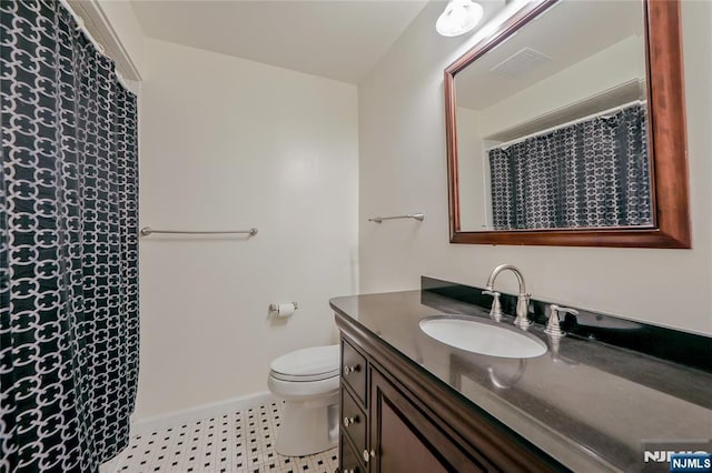 38 Pitcairn Ave, Ho-Ho-Kus, NJ 07423 - full bath featuring vanity, toilet, and baseboards