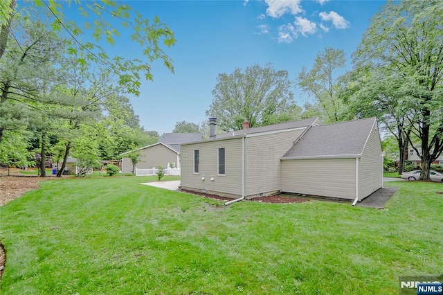 38 Pitcairn Ave, Ho-Ho-Kus, NJ 07423 - rear view of property with a chimney