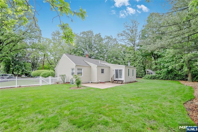 38 Pitcairn Ave, Ho-Ho-Kus, NJ 07423 - back of house featuring a patio, a chimney, and entry steps