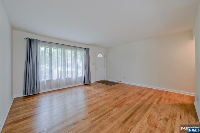 38 Pitcairn Ave, Ho-Ho-Kus, NJ 07423 - spare room with light wood finished floors and baseboards