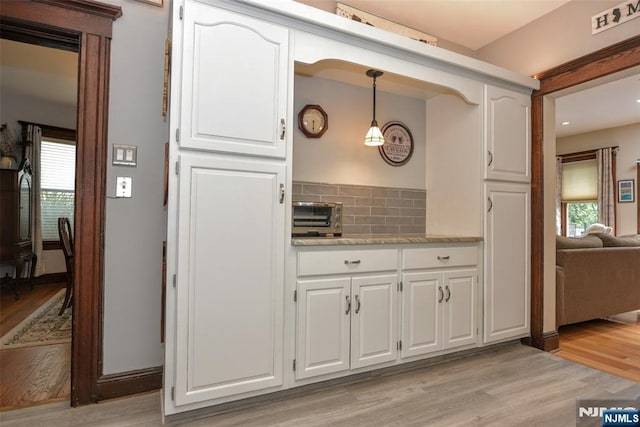 38 Arlington Ave, Hawthorne, NJ 07506 - kitchen with light wood-style flooring, plenty of natural light, white cabinetry, and recessed lighting