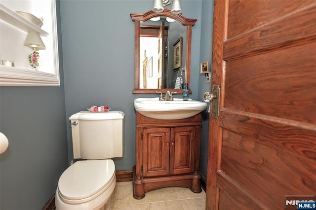 38 Arlington Ave, Hawthorne, NJ 07506 - half bath featuring vanity, tile patterned flooring, and toilet
