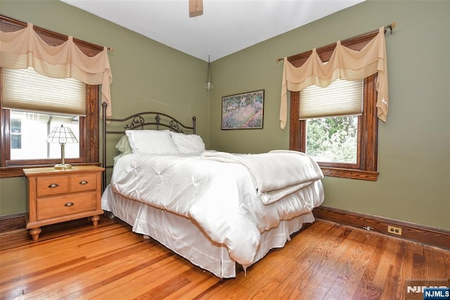 38 Arlington Ave, Hawthorne, NJ 07506 - bedroom with light wood finished floors, baseboards, and ceiling fan