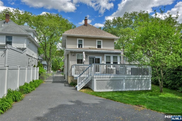38 Arlington Ave, Hawthorne, NJ 07506 - american foursquare style home with a deck, a chimney, and a gate