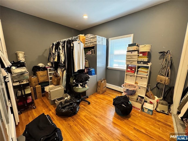 717 1st St, Lyndhurst, NJ 07071 - spacious closet featuring baseboard heating and wood finished floors