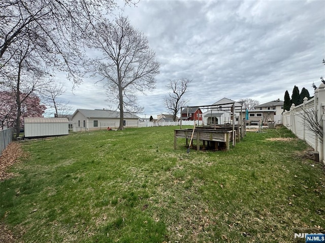 717 1st St, Lyndhurst, NJ 07071 - view of yard with an outdoor structure and a shed