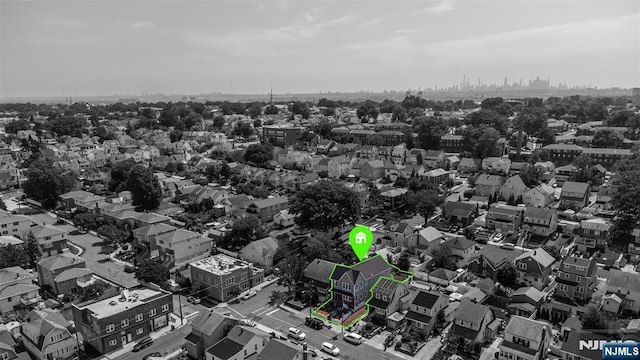 aerial view of residential area with property boundaries highlighted
