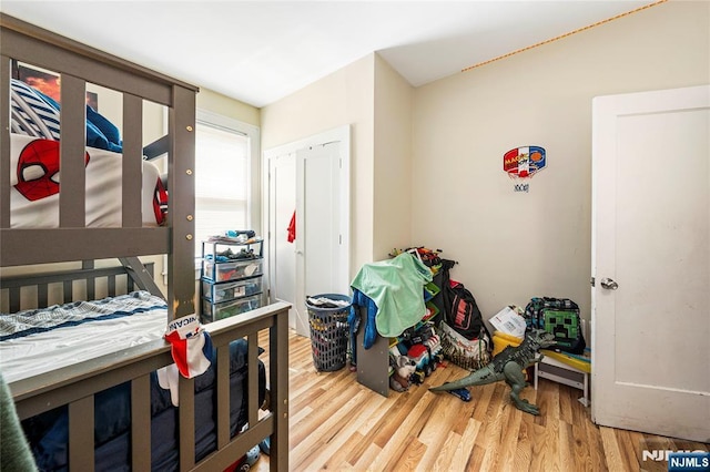 bedroom featuring wood finished floors