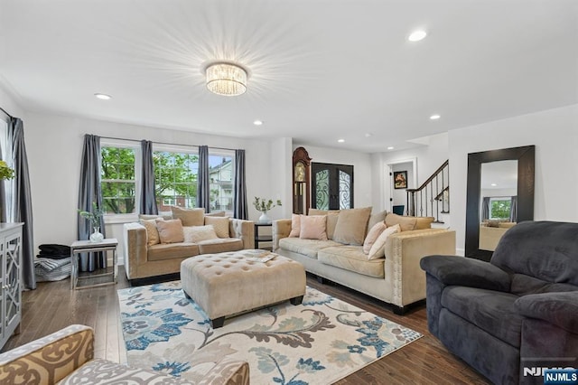 living room featuring stairway, dark wood-style flooring, and recessed lighting