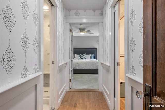 hall with light wood-style floors