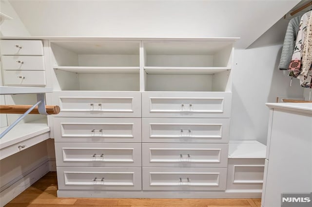 walk in closet featuring light wood-type flooring