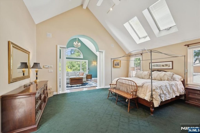 15 Hamilton Rd, Morristown Town, NJ 07960 - bedroom with high vaulted ceiling, dark carpet, a skylight, access to exterior, and beam ceiling