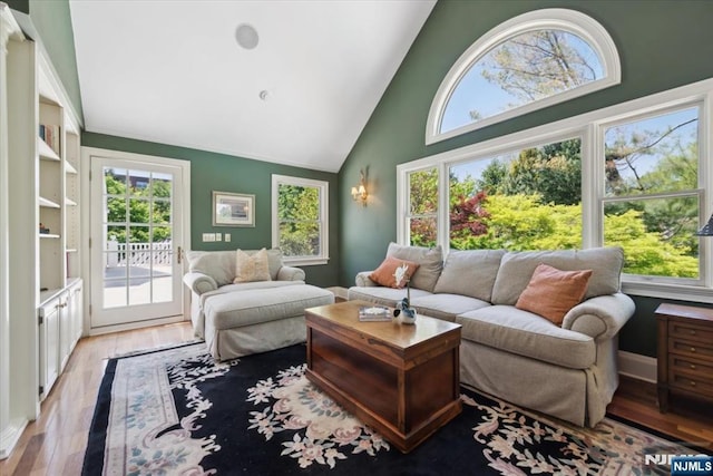 15 Hamilton Rd, Morristown Town, NJ 07960 - living area with high vaulted ceiling, healthy amount of natural light, and wood finished floors