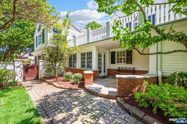 15 Hamilton Rd, Morristown Town, NJ 07960 - back of property featuring a balcony and a gate