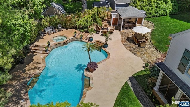 15 Hamilton Rd, Morristown Town, NJ 07960 - view of pool with an in-ground hot tub, a patio, and an outdoor structure